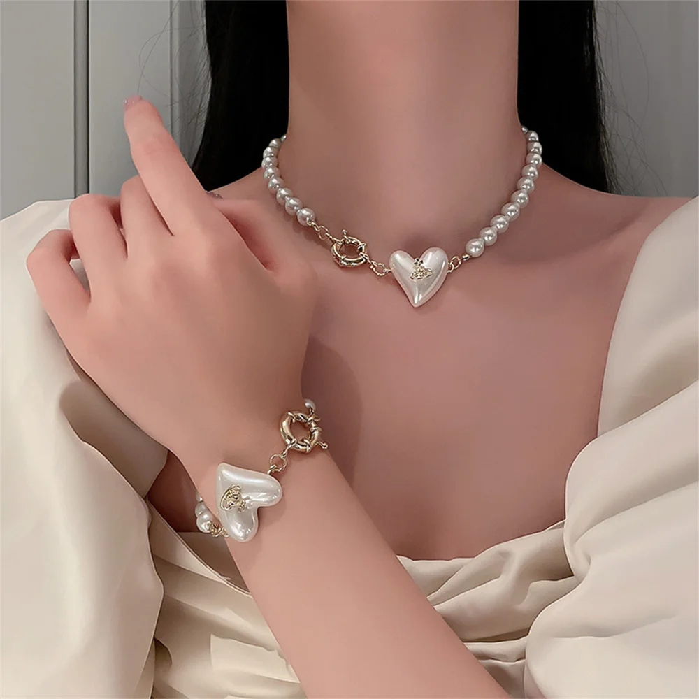 Pearl Heart Statement Necklace Bracelet for Women Beaded Choker Girls Elegant Temperament Love Clavicle Chain Fashion Jewelry
Pearl Heart Statement Necklace Bracelet for Women Beaded Choker Girls Elegant Temperament Love Clavicle Chain Fashion Jewelry