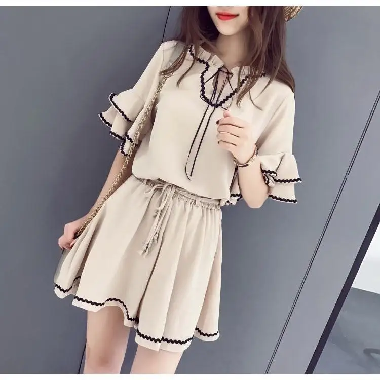 Women 2022 Summer Short Sleeve O-Neck T-shirt + Wide Leg Shorts 2 Two Piece Suit Casual Outfits Female Fashion Clothing Set I42
Women 2022 Summer Short Sleeve O-Neck T-shirt + Wide Leg Shorts 2 Two Piece Suit Casual Outfits Female Fashion Clothing Set I42