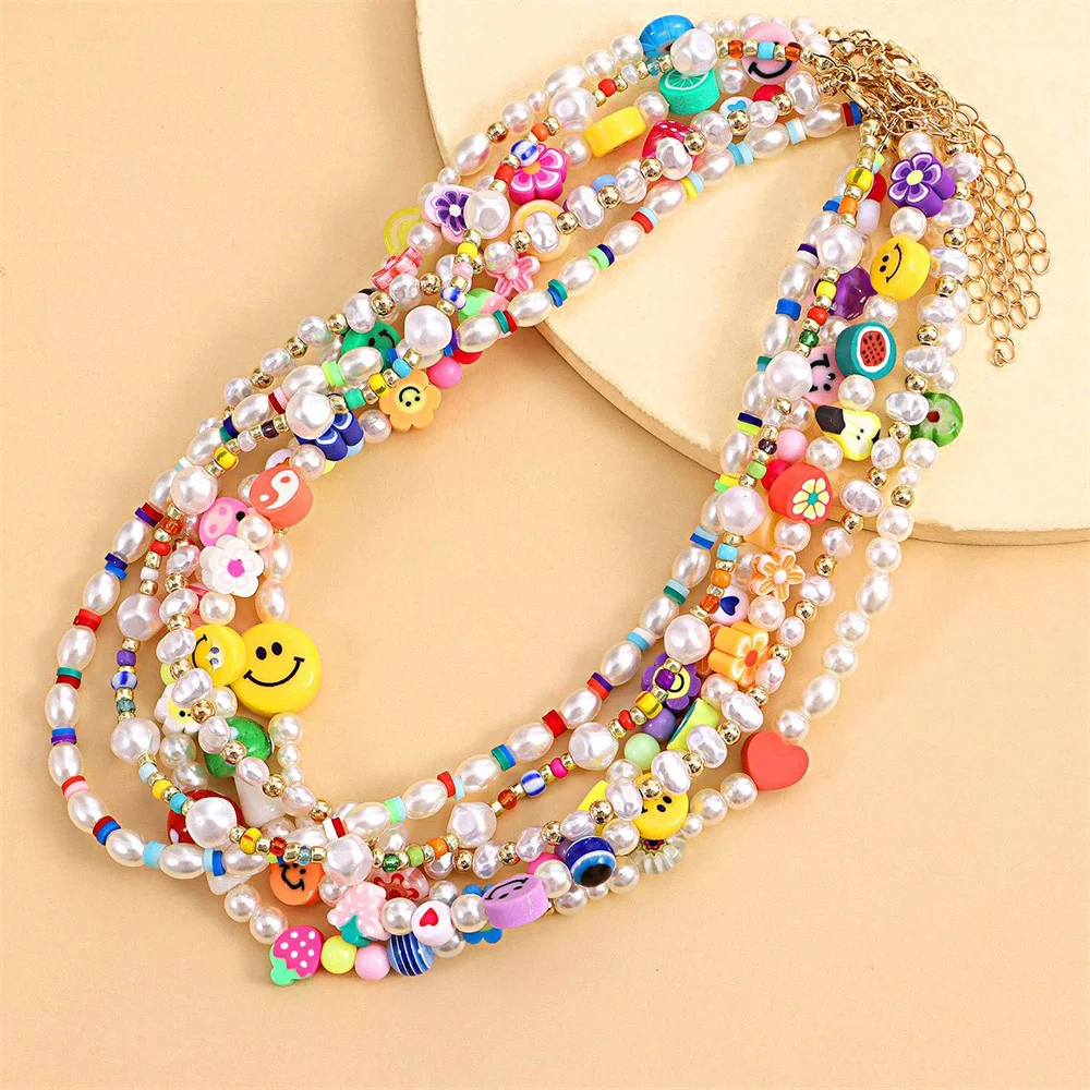 Multi element fashion trend pearl necklace cartoon painted soft pottery fruit smiling face women's gift
Multi element fashion trend pearl necklace cartoon painted soft pottery fruit smiling face women's gift