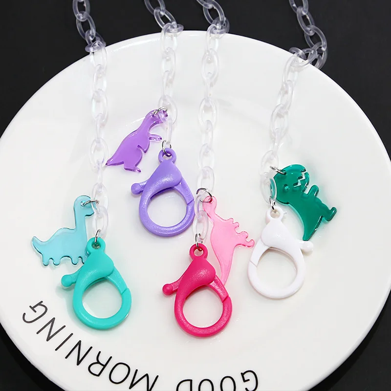 2022 New Transparent Acrylic Children Masks Chain Glasses Chains Cartoon Candy Color Dinosaur Mask Hanging Rope for Kids Student
2022 New Transparent Acrylic Children Masks Chain Glasses Chains Cartoon Candy Color Dinosaur Mask Hanging Rope for Kids Student