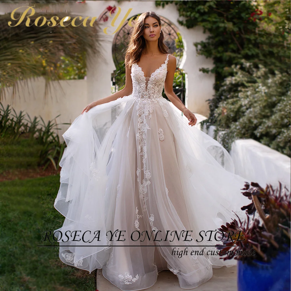 

Roseca Ye A-Line Wedding Dress 2022 Charming Sweetheart Beaded Appliques Bride Spaghetti Straps Backless Beach Bridal Gown