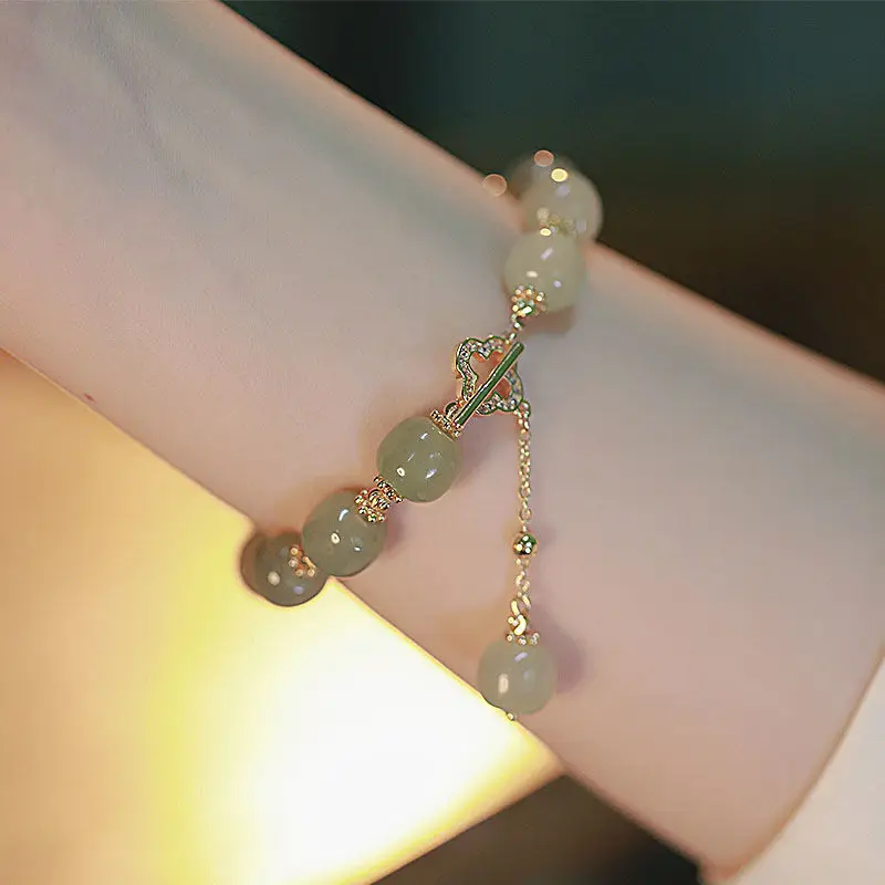 New Fashion Vintage Glass Jade Beaded Bracelet Luxury Temperament Natural Stone Bells Long Tassel Bracelet Party Ladies Jewelry
New Fashion Vintage Glass Jade Beaded Bracelet Luxury Temperament Natural Stone Bells Long Tassel Bracelet Party Ladies Jewelry