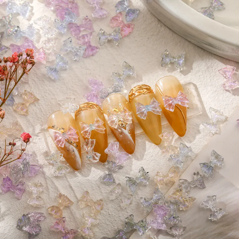 100Pc Nail Art Accessories 3D Brilliant Transparent Silver Powder Aurora Bow Nail Decorations DIY Resin Manicure Charms Supplies
100Pc Nail Art Accessories 3D Brilliant Transparent Silver Powder Aurora Bow Nail Decorations DIY Resin Manicure Charms Supplies