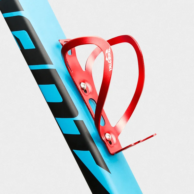 Bicycle water bottle holder, aluminum alloy mountain bike cup holder, water bottle bracket, cycling equipment accessories.
Bicycle water bottle holder, aluminum alloy mountain bike cup holder, water bottle bracket, cycling equipment accessories.