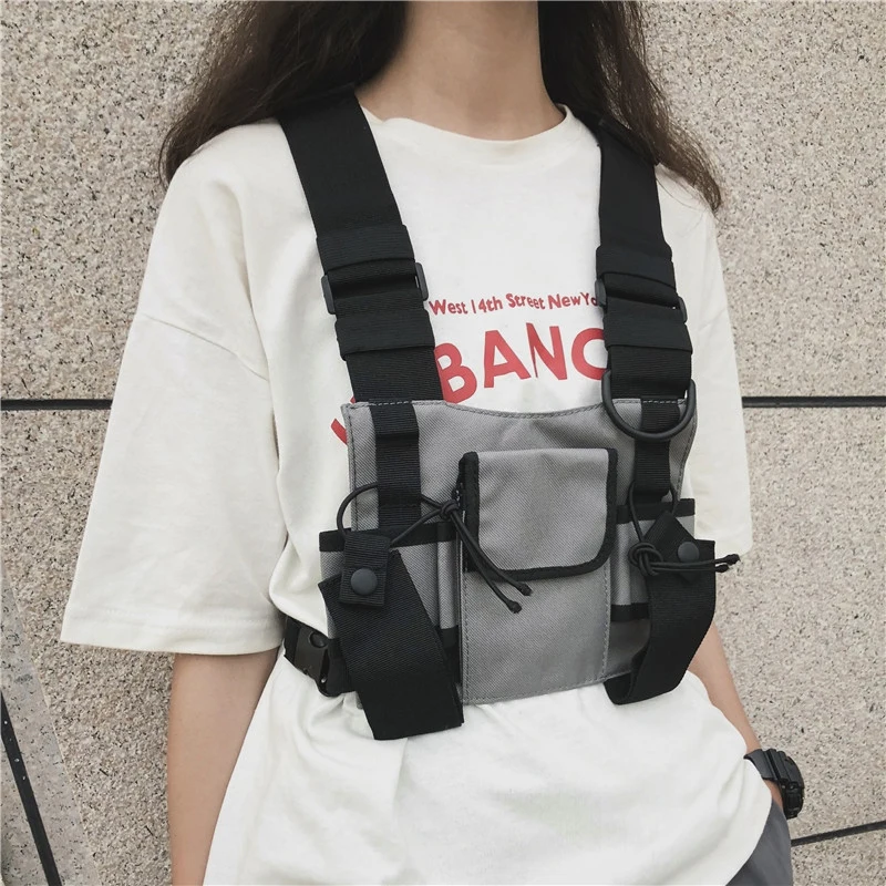 Men Women Chest Rig Bag Multi-pocket Vest Hip Hop Streetwear Functional Tactical Harness Pack Adjustable Waist Bag
Men Women Chest Rig Bag Multi-pocket Vest Hip Hop Streetwear Functional Tactical Harness Pack Adjustable Waist Bag