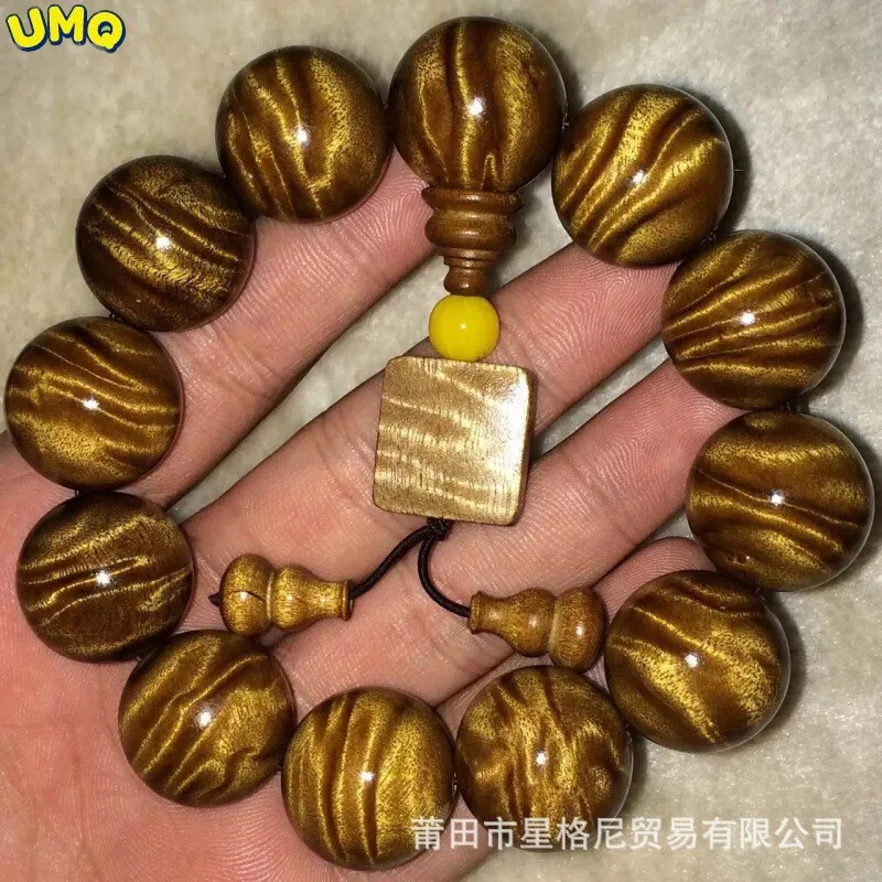 Sichuan Golden Phoebe 20mm Hand String Buddha Beads Small Leaf Zhennan Golden Phoebe Water Wave Shadow Male and Female Buddha
Sichuan Golden Phoebe 20mm Hand String Buddha Beads Small Leaf Zhennan Golden Phoebe Water Wave Shadow Male and Female Buddha