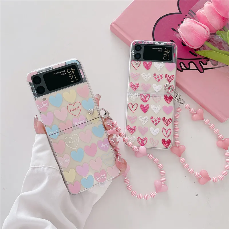 For Samsung Z Flip 4 3 Love heart Transparent Folding Phone Case With Bracelet For Samsung Z Flip 3 5G ZFlip4 Hard PC Back Cover
For Samsung Z Flip 4 3 Love heart Transparent Folding Phone Case With Bracelet For Samsung Z Flip 3 5G ZFlip4 Hard PC Back Cover