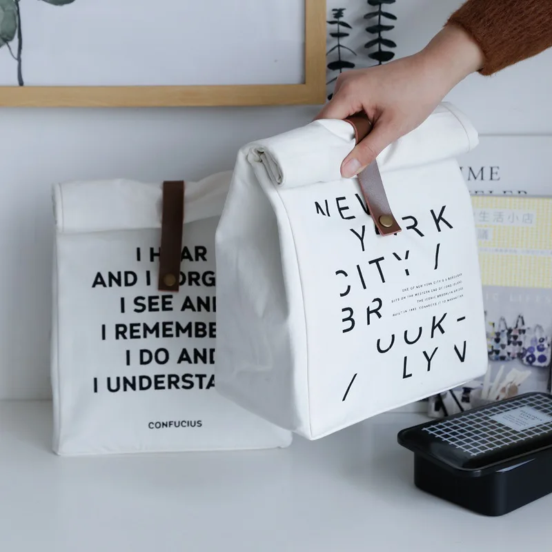 Original Design Nordic Ins Simple Letter Bento Insulation Bag Small Fresh Leather Buckle Canvas Picnic Bag Wholesale
Original Design Nordic Ins Simple Letter Bento Insulation Bag Small Fresh Leather Buckle Canvas Picnic Bag Wholesale