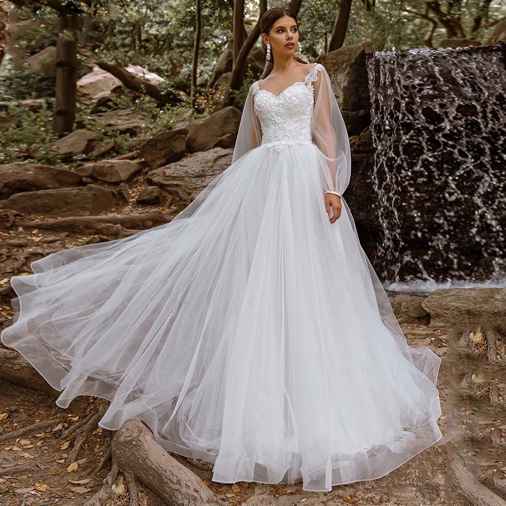 Roseca Ye Lace Appliqués Glitter Wedding Dresses Sheer Neck A Line Long Lantern Sleeves Fashional Bridal Gowns 2023 New Vestido
Roseca Ye Lace Appliqués Glitter Wedding Dresses Sheer Neck A Line Long Lantern Sleeves Fashional Bridal Gowns 2023 New Vestido