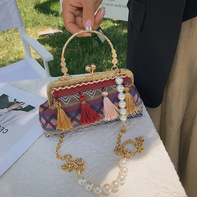 Small Bag Women's Bag Trend 2022 New Trendy Fashion Tassel Clip Buckle Bag Ethnic Style Single Shoulder Messenger Bag Hand-held
Small Bag Women's Bag Trend 2022 New Trendy Fashion Tassel Clip Buckle Bag Ethnic Style Single Shoulder Messenger Bag Hand-held