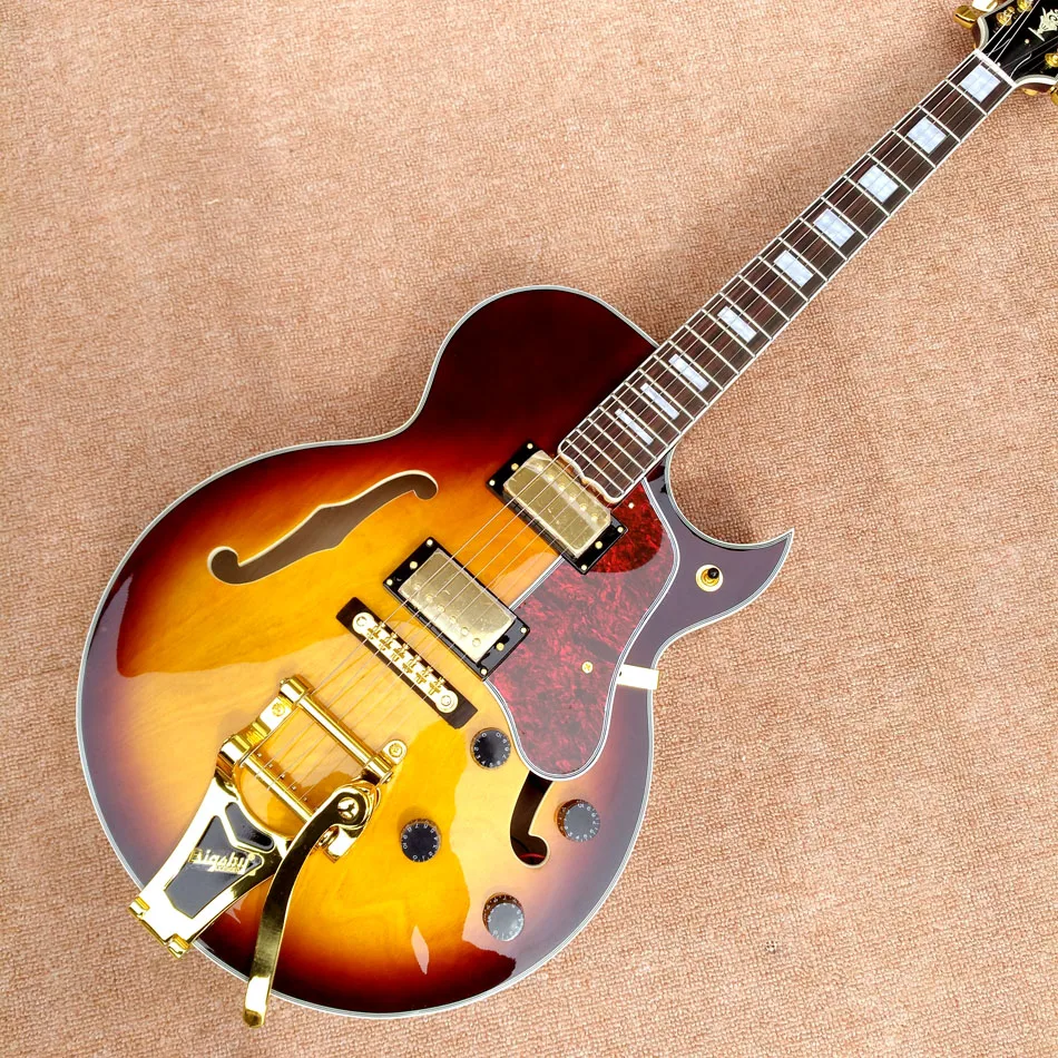 L-5 Jazz Hollow Body Electric Guitar, Rosewood fingerboard, Tremolo system, 2 F holes, Dark sunburst electric guitar
L-5 Jazz Hollow Body Electric Guitar, Rosewood fingerboard, Tremolo system, 2 F holes, Dark sunburst electric guitar