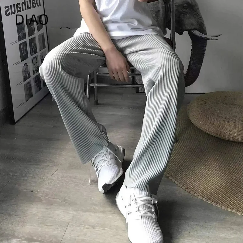 Issey Miyake Pleated Pants 2023 New Japanese Fashion High Street Draping Loose Large Casual Straight Trousers For Men and Women 
Issey Miyake Pleated Pants 2023 New Japanese Fashion High Street Draping Loose Large Casual Straight Trousers For Men and Women