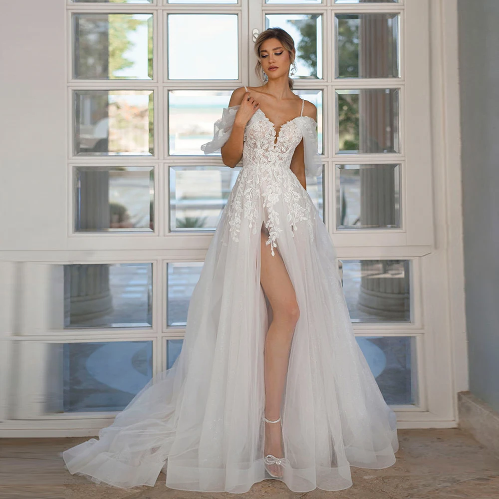 Exquisite Beach Wedding Dress Spaghetti Straps Lace Side Split Bohemian Tulle Bridal Gown Sleeveless Backless Robe De Mariee
Exquisite Beach Wedding Dress Spaghetti Straps Lace Side Split Bohemian Tulle Bridal Gown Sleeveless Backless Robe De Mariee