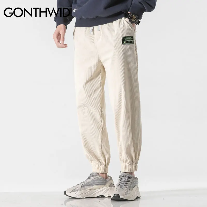 Мужские вельветовые брюки, уличная одежда 2022, повседневные однотонные Джоггеры в стиле хип-хоп, шаровары, мешковатые спортивные брюки в сти... 
Мужские вельветовые брюки, уличная одежда 2022, повседневные однотонные Джоггеры в стиле хип-хоп, шаровары, мешковатые спортивные брюки в сти...