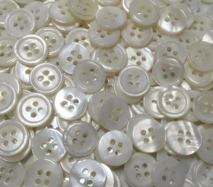500 pcs/lot 9mm fashion natural White mother of pearl shell button with 4 holes shirt button Sewing Buttons
500 pcs/lot 9mm fashion natural White mother of pearl shell button with 4 holes shirt button Sewing Buttons