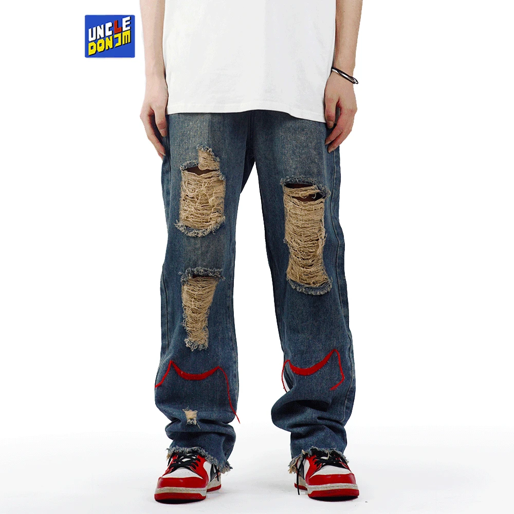 UNCLEDONJM High street ripped jeans men hip hop oversized straight trousers fashion distressed boyfriend jeans punk pants
UNCLEDONJM High street ripped jeans men hip hop oversized straight trousers fashion distressed boyfriend jeans punk pants