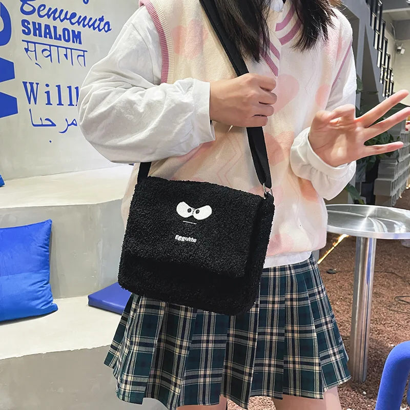 Women new Japanese ins cute funny shoulder bag personality expression little monster girl student plush messenger bag
Women new Japanese ins cute funny shoulder bag personality expression little monster girl student plush messenger bag