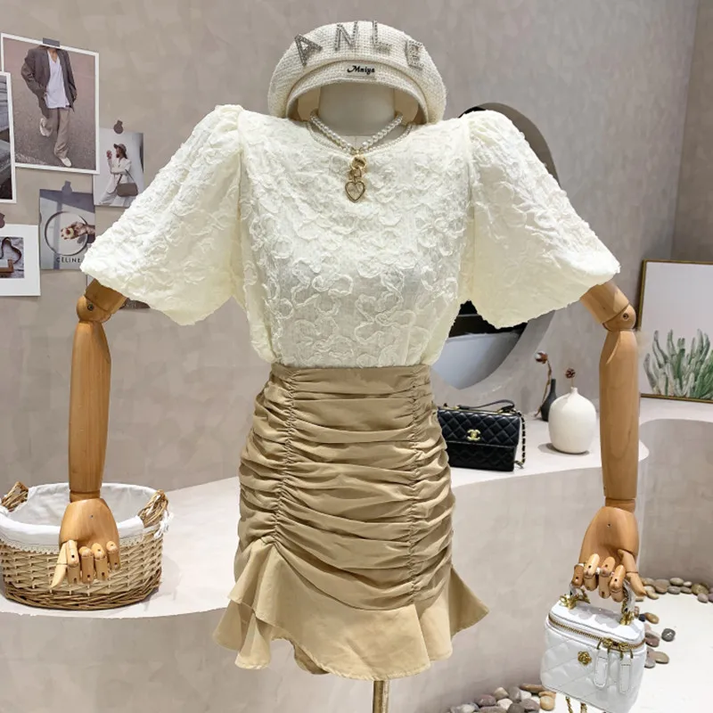 New Women's Clothing 2022 Summer Bubble short sleeve round neck top + high waist pleated Ruffle Skirt two-piece set
New Women's Clothing 2022 Summer Bubble short sleeve round neck top + high waist pleated Ruffle Skirt two-piece set