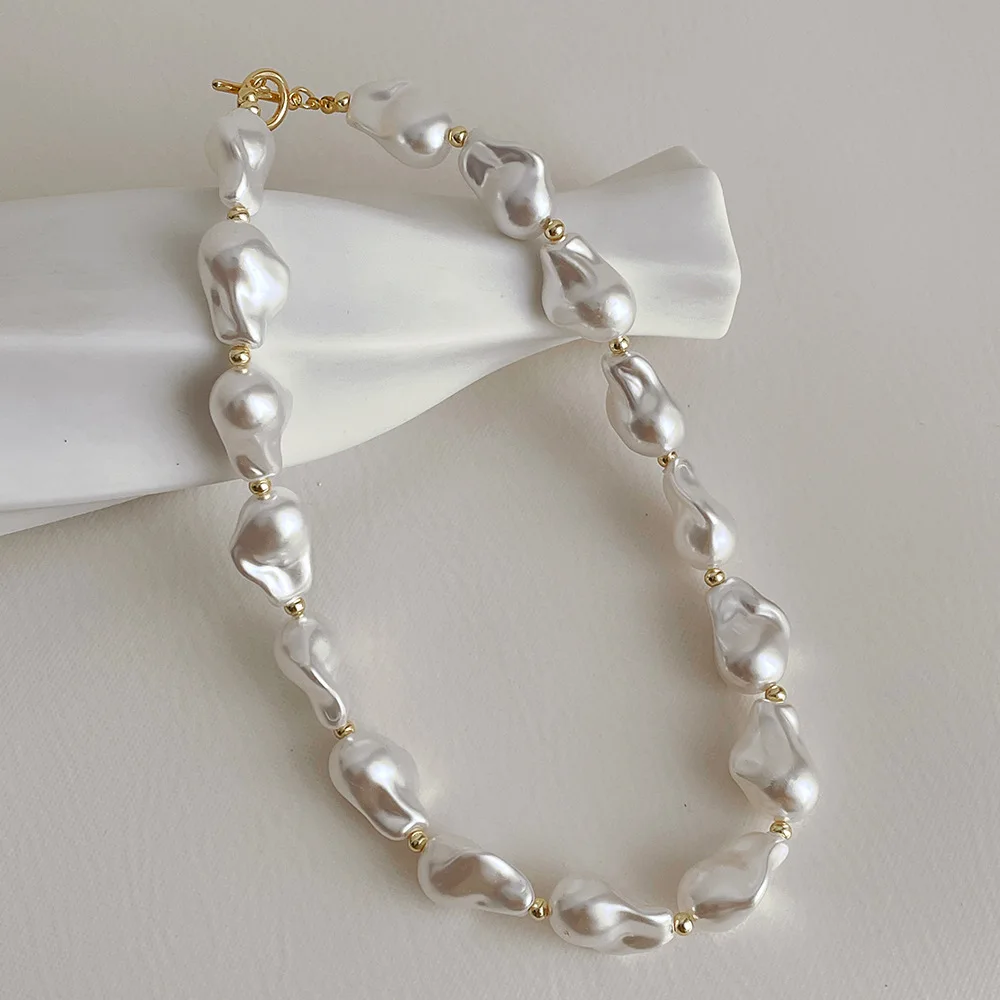 French Retro Classic Large Irregular Baroque Pearl OT Buckle Necklace Trend Temperament And All-Match Clavicle
French Retro Classic Large Irregular Baroque Pearl OT Buckle Necklace Trend Temperament And All-Match Clavicle
