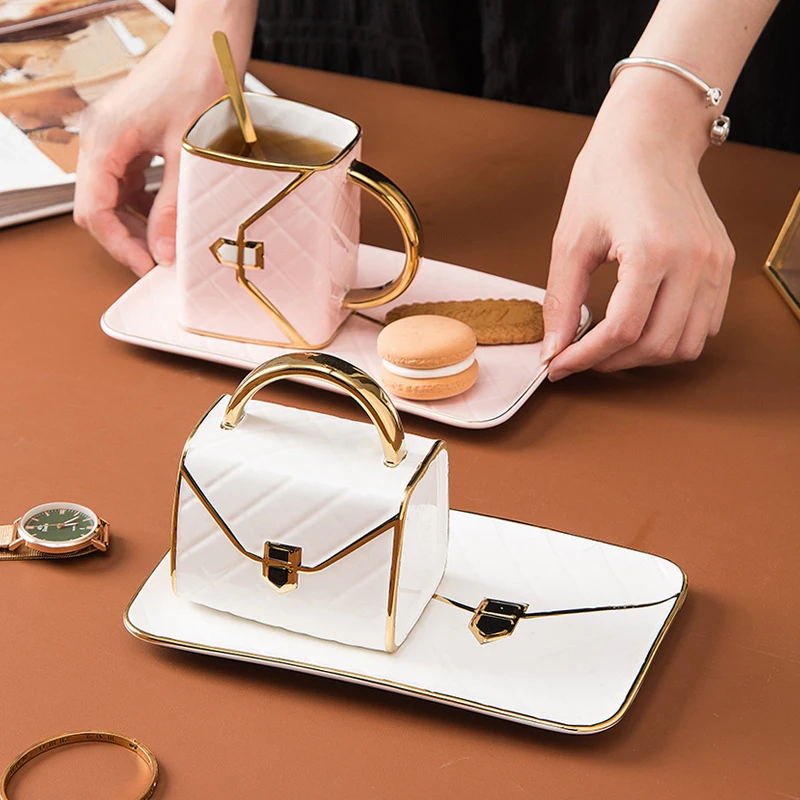 Custom Delicate Bag Shaped Espresso Cup Porcelain Teacup And Saucer Ceramic Coffee Tea Cup With Saucer
Custom Delicate Bag Shaped Espresso Cup Porcelain Teacup And Saucer Ceramic Coffee Tea Cup With Saucer