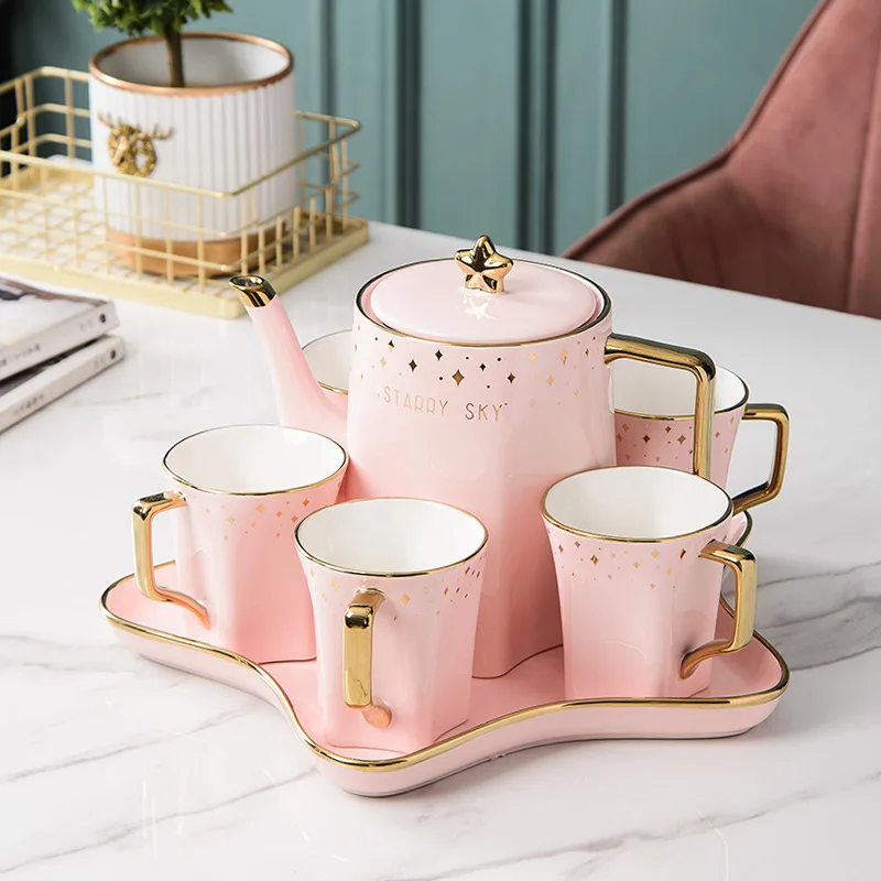 New luxury starry ceramic water ware fashion gift ceramic tea set wholesale a pot of four cups and a tray.
New luxury starry ceramic water ware fashion gift ceramic tea set wholesale a pot of four cups and a tray.