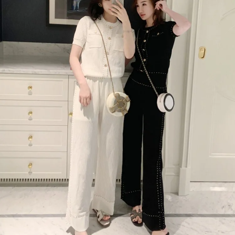 New 2022 Summer Elegant Tracksuit Knitted Suit Women Fashion Buttons Short Sleeve Top And wide leg pants Casual Two Piece Set
New 2022 Summer Elegant Tracksuit Knitted Suit Women Fashion Buttons Short Sleeve Top And wide leg pants Casual Two Piece Set