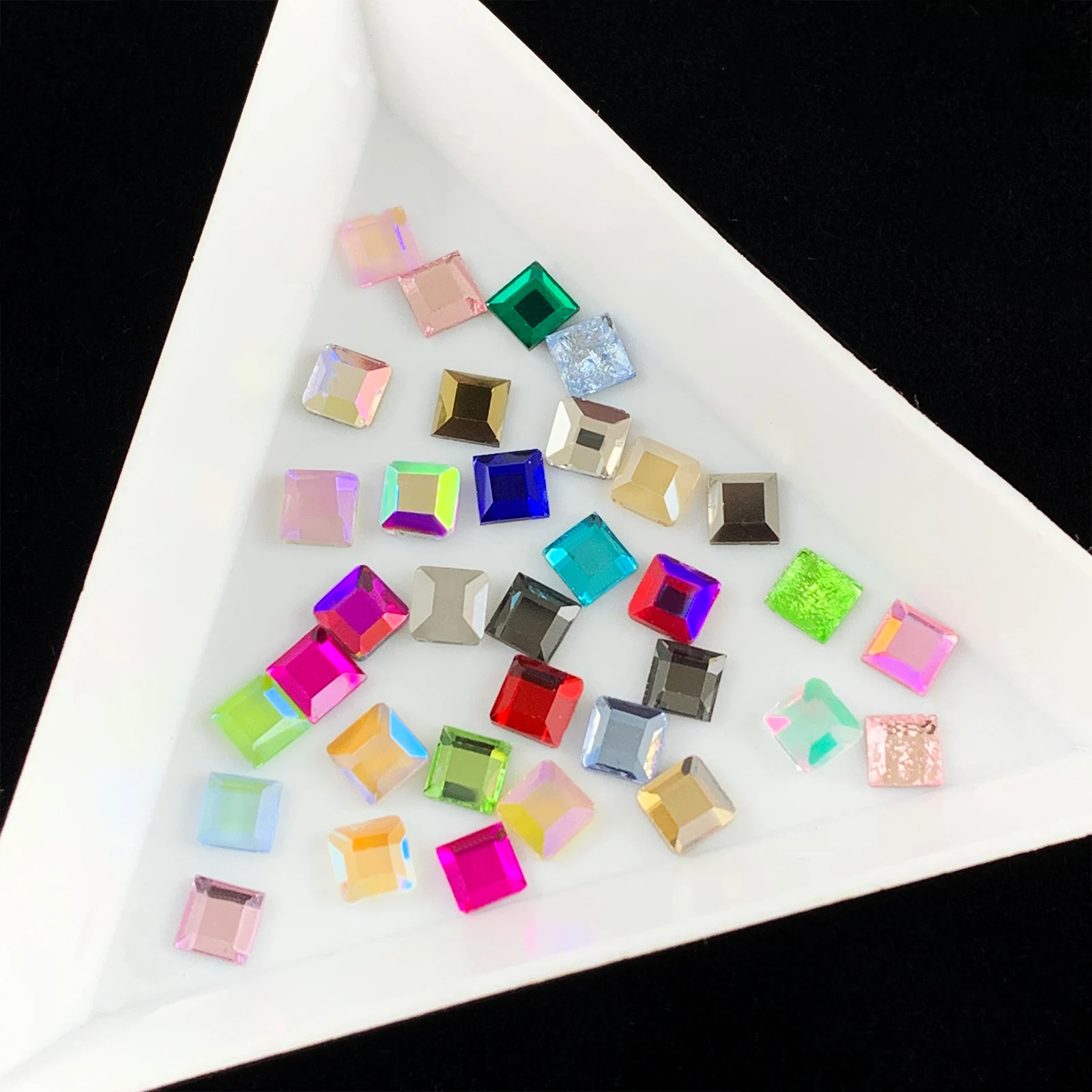 Hot Sale Mini Square Nail Art Rhinestones 20 Colors Fancy Crystal Stones 50Pcs For 3D Nail Art Decoration
Hot Sale Mini Square Nail Art Rhinestones 20 Colors Fancy Crystal Stones 50Pcs For 3D Nail Art Decoration