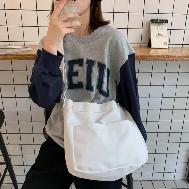 New Canvas Schoolbag Nylon Handbag Large Capacity Fashion Messenger Bag Women's Shoulder Bag Outdoors Waterproof Traveling Bag
New Canvas Schoolbag Nylon Handbag Large Capacity Fashion Messenger Bag Women's Shoulder Bag Outdoors Waterproof Traveling Bag