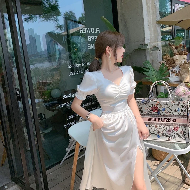Women Summer Sexy White Puff Sleeve Slim White Dress Elegant Sweet Long Cottagecore Dresses New Fairy Satin V-neck Side Slit
Women Summer Sexy White Puff Sleeve Slim White Dress Elegant Sweet Long Cottagecore Dresses New Fairy Satin V-neck Side Slit