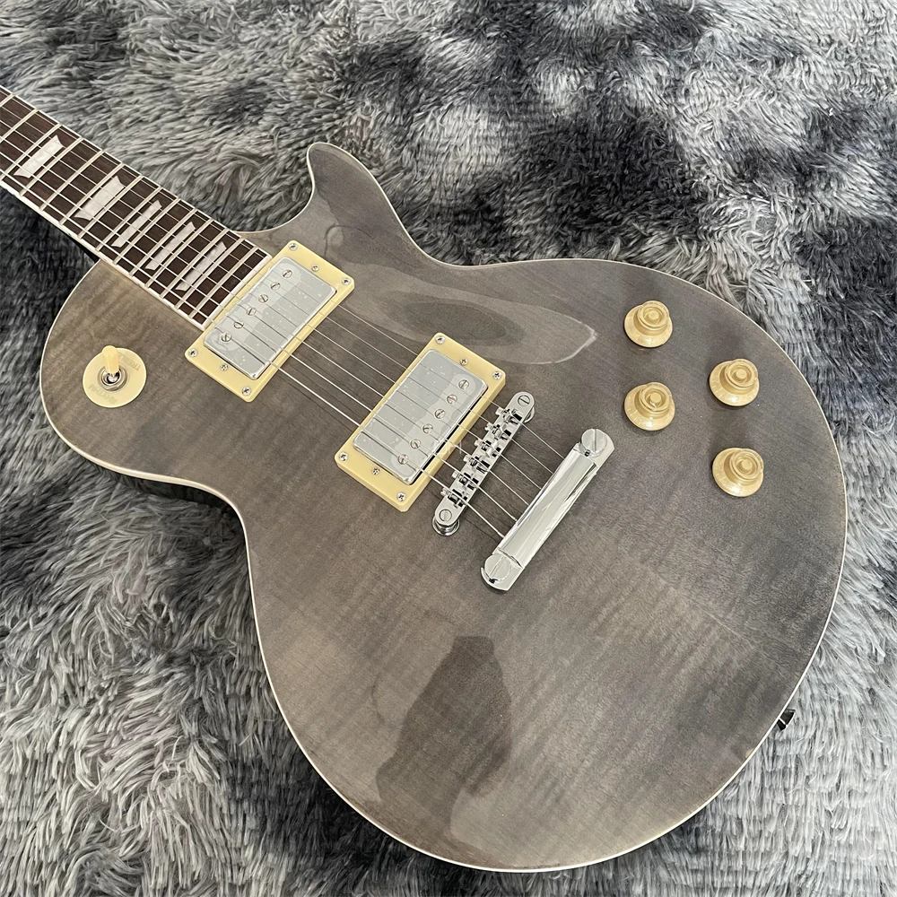 Transpartent Black 6-String hand made electric guitar Mahogany body Maple Neck
Transpartent Black 6-String hand made electric guitar Mahogany body Maple Neck