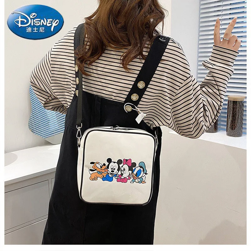 Новая дамская сумочка Disney 2022 с Микки Маусом, милая мультяшная дамская сумка на плечо, роскошная брендовая Вместительная дорожная сумка, сум...
Новая дамская сумочка Disney 2022 с Микки Маусом, милая мультяшная дамская сумка на плечо, роскошная брендовая Вместительная дорожная сумка, сум...