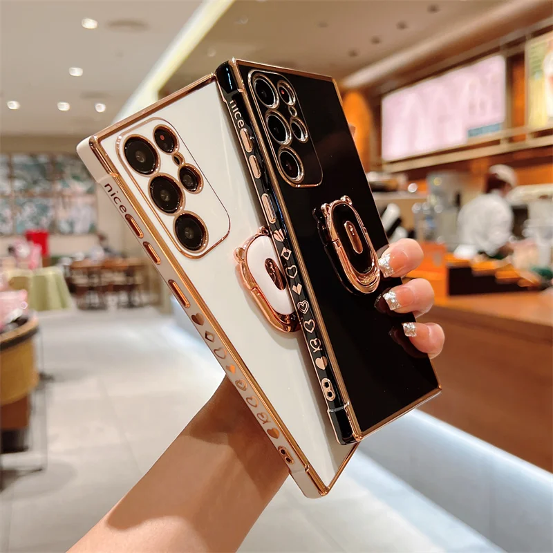 Bear Ring Holder Phone Case For Samsung Galaxy S22 S21 Plus Ultra S20 FE A53 A13 A12 A52 A52S Plating Side Love Heart Back Cover
Bear Ring Holder Phone Case For Samsung Galaxy S22 S21 Plus Ultra S20 FE A53 A13 A12 A52 A52S Plating Side Love Heart Back Cover