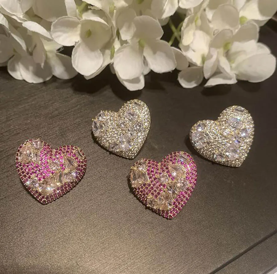Korean sweet zircon love earrings luxury niche design women romance heart shape classic stud earring
Korean sweet zircon love earrings luxury niche design women romance heart shape classic stud earring
