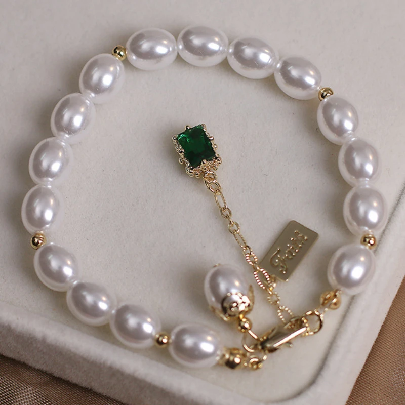 Женский винтажный браслет с жемчугом, белый браслет с искусственным жемчугом и зелеными кристаллами, Ювелирное Украшение в стиле барокко, П... 
Женский винтажный браслет с жемчугом, белый браслет с искусственным жемчугом и зелеными кристаллами, Ювелирное Украшение в стиле барокко, П...