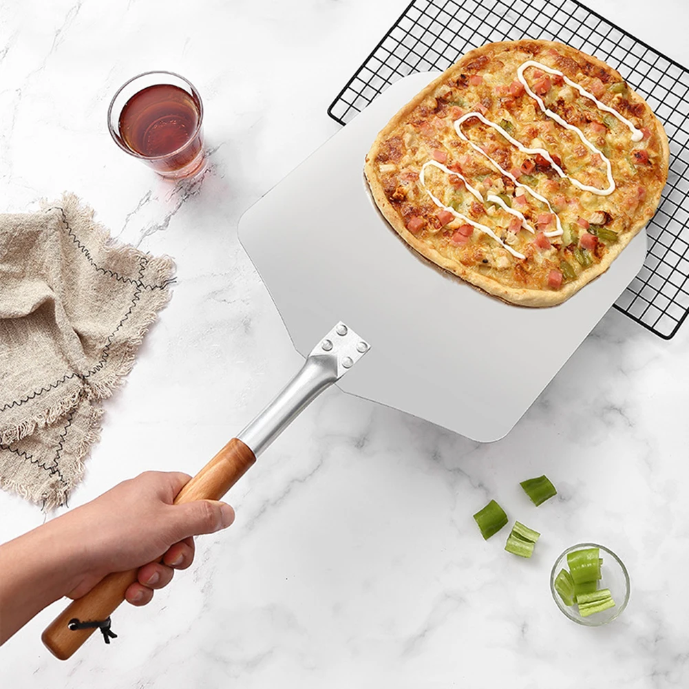 65 cm Aluminum Pizza Shovel with Wooden Handle Pala Cake Baking Tools Accessory Pizza Knife Cheese Cutter Peels Shovel
65 cm Aluminum Pizza Shovel with Wooden Handle Pala Cake Baking Tools Accessory Pizza Knife Cheese Cutter Peels Shovel