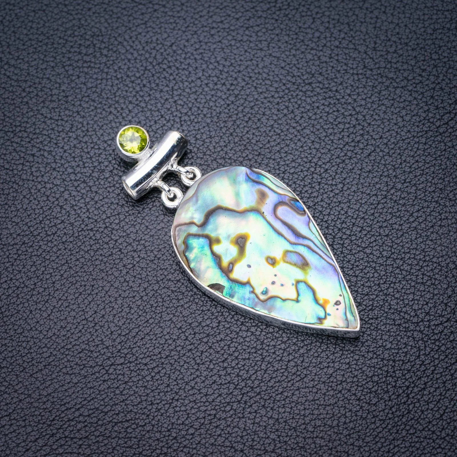 StarGems Natural Abalone Shell Peridot Handmade 925 Sterling Silver Pendant 2.25" E4748
StarGems Natural Abalone Shell Peridot Handmade 925 Sterling Silver Pendant 2.25" E4748