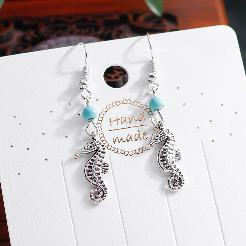 Vintage Silver Beach Seahorse Earrings for Women Boho Bead Nature Stone Sea Animal Nautical Hippocampus Earrings Female Jewelry
Vintage Silver Beach Seahorse Earrings for Women Boho Bead Nature Stone Sea Animal Nautical Hippocampus Earrings Female Jewelry