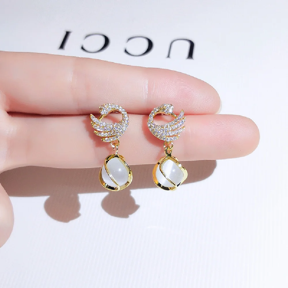 

S925 needle swan earrings New product tide Korean temperament cat's eye ear studs net red earrings fashion earrings wholesale 1$