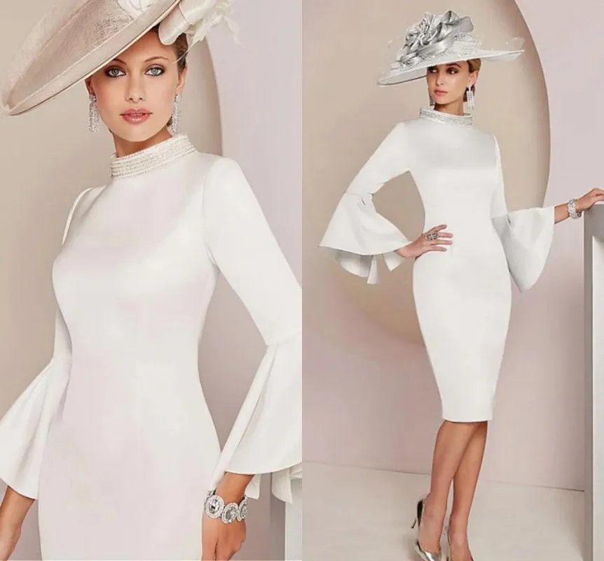 Vintage Column Mother of the Bride Dress 2022 High Neck Pearls Knee Length Long Sleeve Satin Formal Party Gowns Robe De Soriee
Vintage Column Mother of the Bride Dress 2022 High Neck Pearls Knee Length Long Sleeve Satin Formal Party Gowns Robe De Soriee