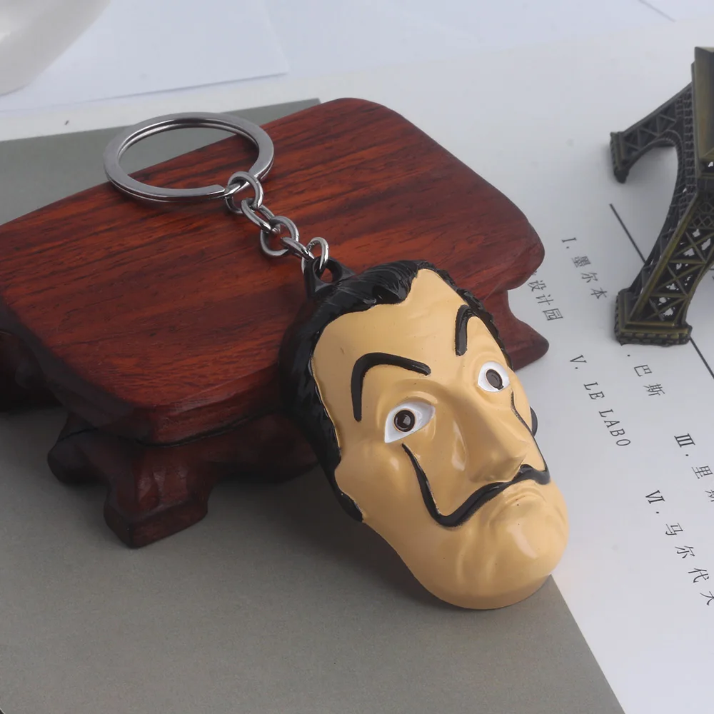 Spanish TV La Casa De Papel KeyChain Money Heist The House of Paper Salvador Dali Mask Key Chain Men Women Fashion Jewelry
Spanish TV La Casa De Papel KeyChain Money Heist The House of Paper Salvador Dali Mask Key Chain Men Women Fashion Jewelry