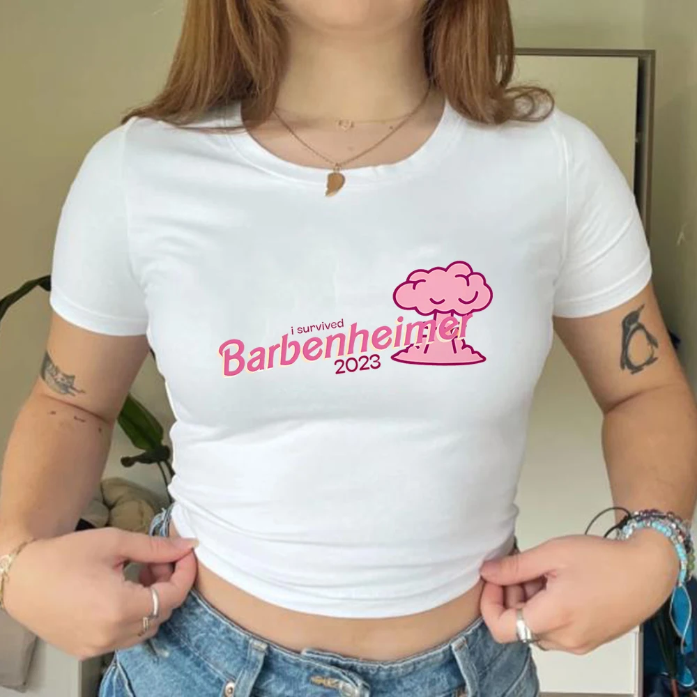 Укороченный топ Barbenheimer в эстетике розовая детская футболка в стиле харадзюку с рисунком Dolly, модная футболка из фильма, женская уличная одежда, укороченные топы
Укороченный топ Barbenheimer в эстетике розовая детская футболка в стиле харадзюку с рисунком Dolly, модная футболка из фильма, женская уличная одежда, укороченные топы