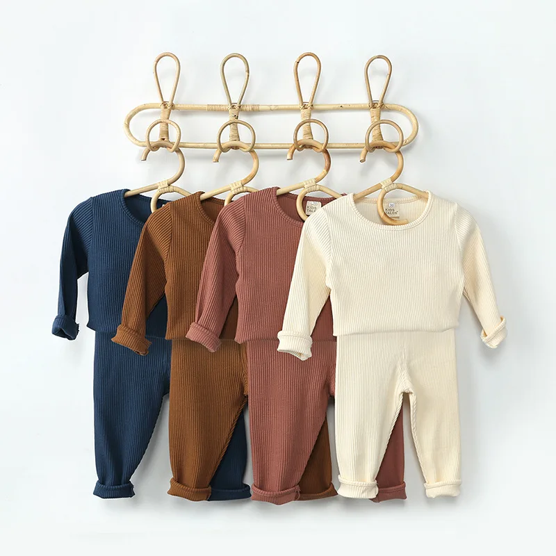 Spring and Autumn Children's Pajamas Baby Baby Solid Color Pullover Pure Cotton Elastic Waist Pit Stripe Home Clothes Set
Spring and Autumn Children's Pajamas Baby Baby Solid Color Pullover Pure Cotton Elastic Waist Pit Stripe Home Clothes Set