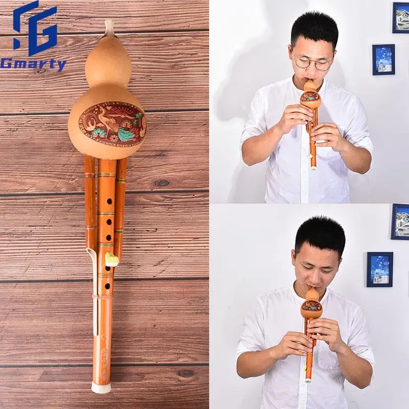 Chinese Handmade Hulusi Brown Bamboo Gourd Cucurbit Flute Ethnic Musical Instrument Key Beginner Music Lovers 40*8CM
Chinese Handmade Hulusi Brown Bamboo Gourd Cucurbit Flute Ethnic Musical Instrument Key Beginner Music Lovers 40*8CM