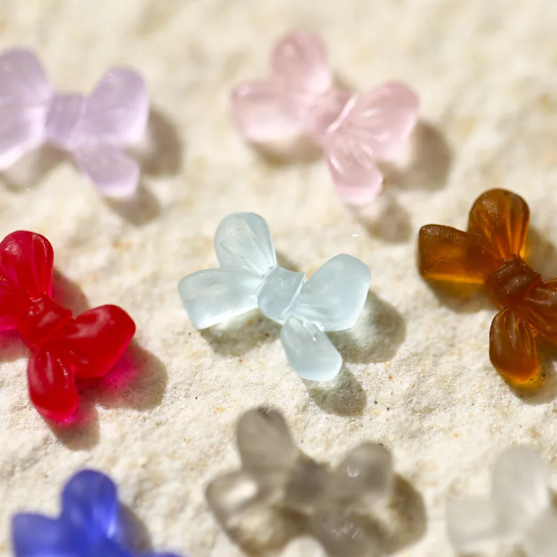 50PCS 3D Matt Resin Bow Nail Art Charms Samll Size Frosted Transparent Bowknot For Nails Decoration Manicure Accessory Supplies
50PCS 3D Matt Resin Bow Nail Art Charms Samll Size Frosted Transparent Bowknot For Nails Decoration Manicure Accessory Supplies