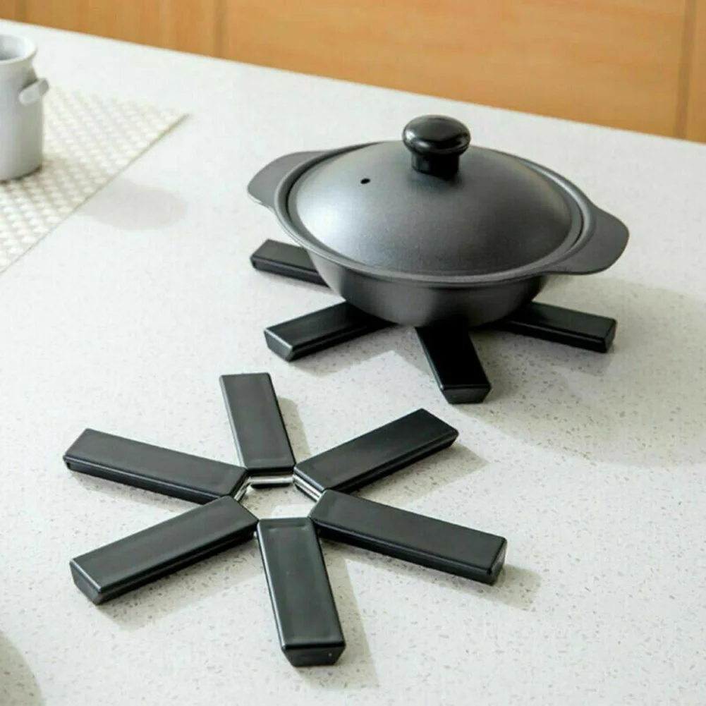 Creative Foldable Non-slip Heat Resistant Insulation Pad Placemat Trivet Pan Pot Holder Mat Coaster Cushion Kitchen Accessories
Creative Foldable Non-slip Heat Resistant Insulation Pad Placemat Trivet Pan Pot Holder Mat Coaster Cushion Kitchen Accessories