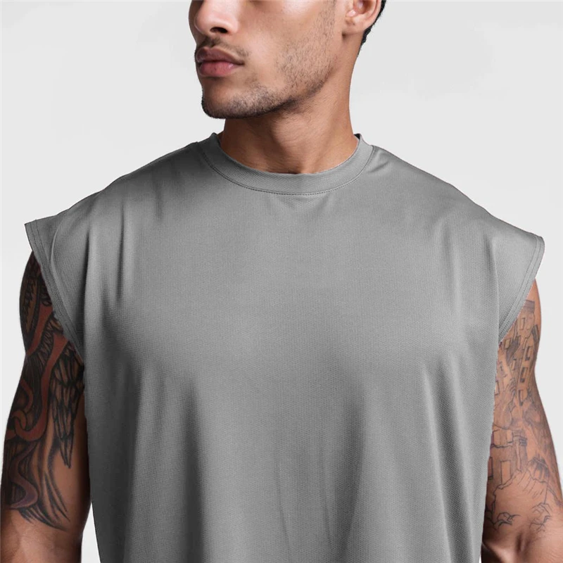 Summer Men's Mesh Gym Vest Quick Dry Loose Fitness Exercise Wide shoulder Sports Sleeveless Shirt Bodybuilding Tank Top
Summer Men's Mesh Gym Vest Quick Dry Loose Fitness Exercise Wide shoulder Sports Sleeveless Shirt Bodybuilding Tank Top