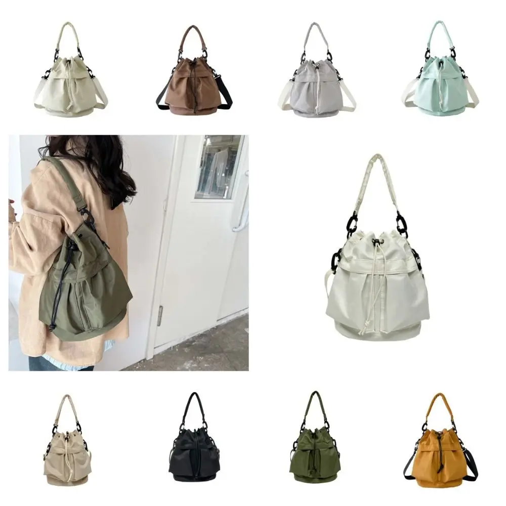 Korean Style Swimming Nylon Crossbody Bag Nylon Large Capacity Bucket Bag Niche Design Tote Bag Drawstring Fitness Bag
Korean Style Swimming Nylon Crossbody Bag Nylon Large Capacity Bucket Bag Niche Design Tote Bag Drawstring Fitness Bag