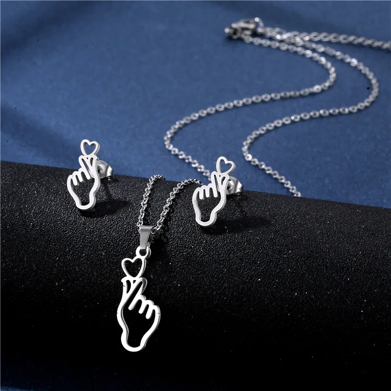 Korean Stainless Steel Jewelry Sets Fashion Finger Heart Gesture Pendants Necklaces for Women Men Stud Earrings Collier Femme
Korean Stainless Steel Jewelry Sets Fashion Finger Heart Gesture Pendants Necklaces for Women Men Stud Earrings Collier Femme