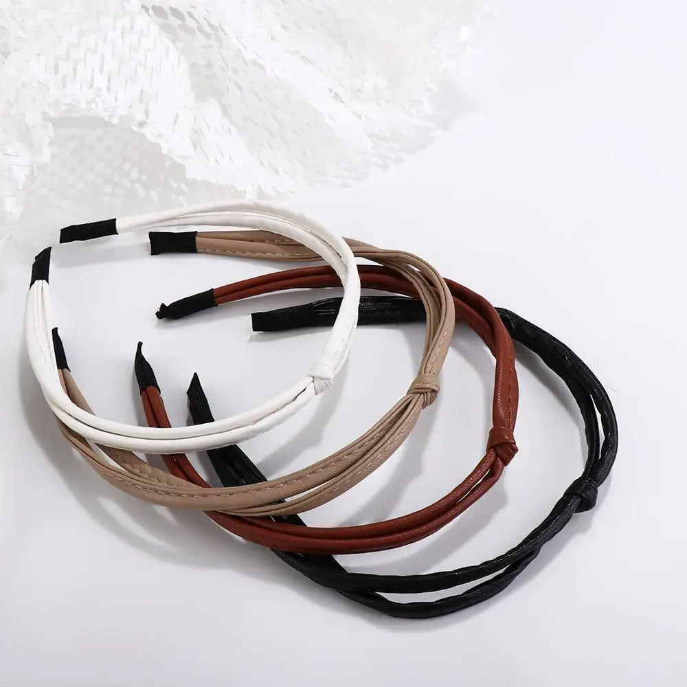 Korean Vintage Knotted Thin PU Leather Solid Color Headband Simple Temperament Elegant Hair Band Hair Hoop Hair Accessories
Korean Vintage Knotted Thin PU Leather Solid Color Headband Simple Temperament Elegant Hair Band Hair Hoop Hair Accessories