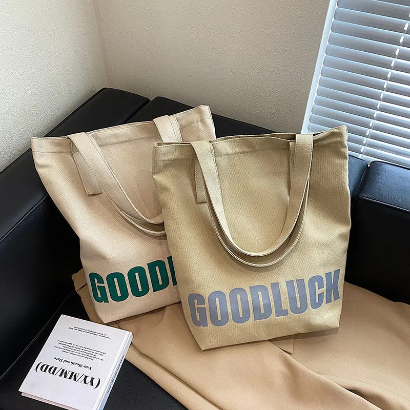 

Japanese and Korean Lazy Canvas bag White Commute New Niche Girl Bag Students Fashion and Literature Zipper Opening and Closing